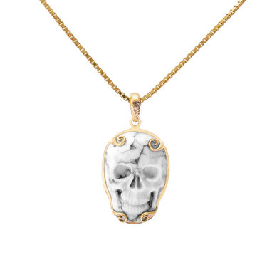 Dije Calavera chica con piedra Howlita